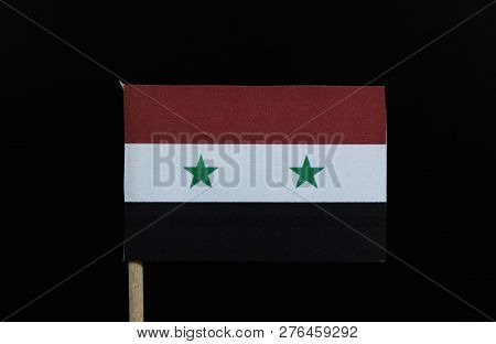 A Symbolic And Official Flag Of Syria On Toothpick On Black Background. A Horizontal Tricolour Of Re