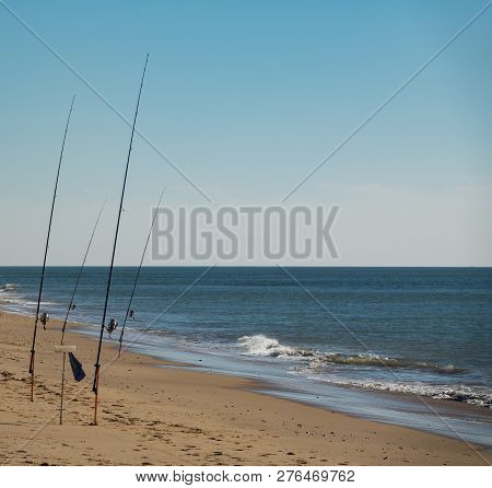 Fishing Rods Fishing In The Beach As Automaton Machines