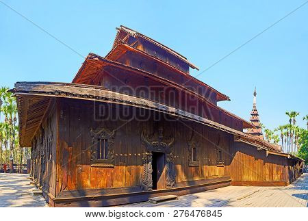 Panorama Of Medieval Wooden Bagaya Monastery With Multistaged (pyatthat) Roof, Wooden Carvings And S