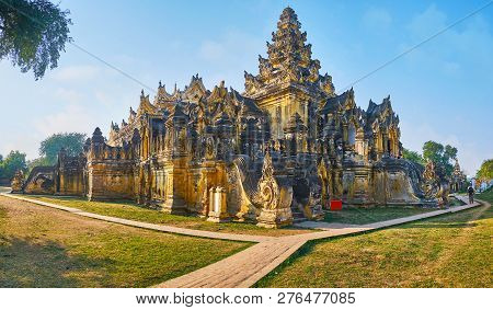 The Unique Historic Building Of Maha Aungmye Bonzan Monastery With Ornate Exterior, Decorated In Bur