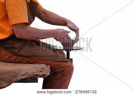Potter Makes Clay Pottery On Circle. Pottery And Craftsmanship Concept.  Isolated On White Backgroun