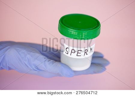 Health. Sperm Analysis. Concept Of Bank Sperm. Infertility. Doctors Hand Holding Container For Analy