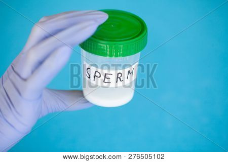Health. Sperm Analysis. Concept Of Bank Sperm. Infertility. Doctors Hand Holding Container For Analy