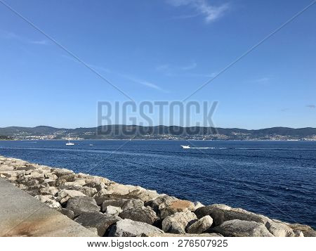 View From The Pier With Boats At The Distance In Sanxenxo Galicia Spain