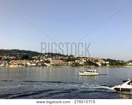 View From The Pier With Boats At The Distance In Sanxenxo Galicia Spain