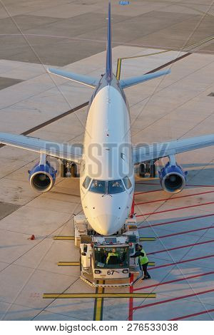 DUSSELDORF, GERMANY - CIRCA OCTOBER, 2018: an aircraft on pushback at Dusseldorf Airport.