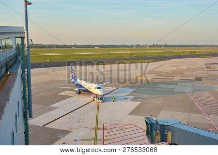 DUSSELDORF, GERMANY - CIRCA OCTOBER, 2018: an aircraft on pushback at Dusseldorf Airport.