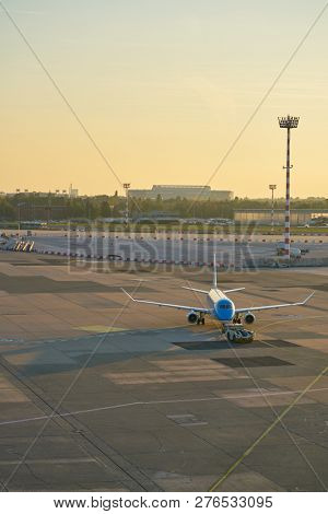DUSSELDORF, GERMANY - CIRCA OCTOBER, 2018: KLM Cityhopper aircraft on pushback at Dusseldorf Airport.