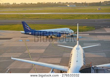DUSSELDORF, GERMANY - CIRCA OCTOBER, 2018: an aircraft on pushback at Dusseldorf Airport.