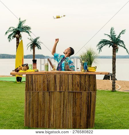 Show Bartenders Outdors, Juggling Bottles And Shaker, Bartender Job On The Beach