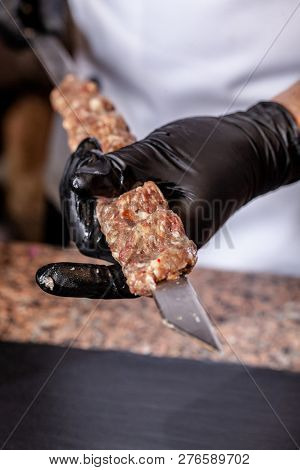 The Concept Of Georgian Cuisine. Recipe For Cooking Meat Lyulya Kebab In The Dough On The Grill. Che