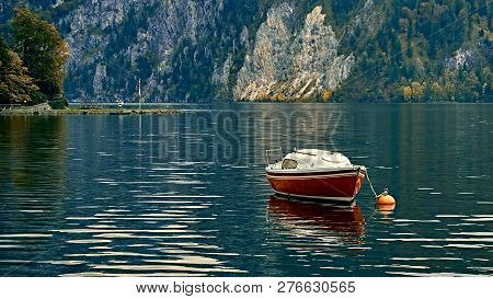 Beautiful Scenic Sunset Over Austrian Alps Lake. Boats, Yachts In The Sunlight Infront Of Church On 