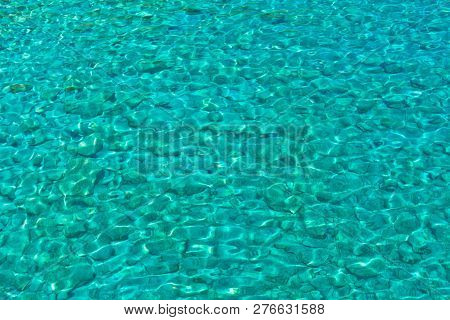 Crystal Clear Blue Water Of Marmara Beach, Near Aradena Gorge, Island Of Crete, Greece