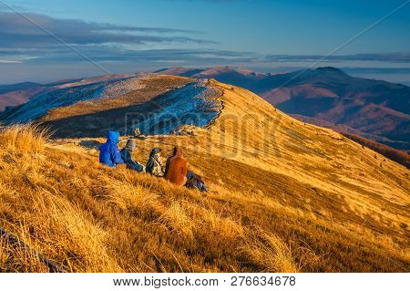 Wetlina, Poland, November 12, 2011:group Of People Enjoy The Sunset Over Bieszczady Mountains, South