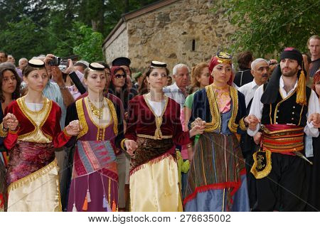SUMELA MONASTERY, TRABZON, TURKEY - AUGUST 15, 2008: Greek dancers during the celebration of Dormition of the Mother of God. The Greeks were expelled from Turkey in 1923