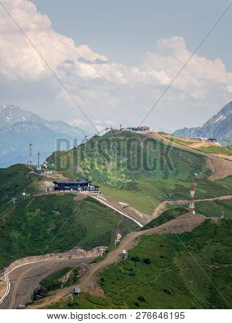 Serpentine Road To The Top Of A High Mountain Range With Cable Cars. Krasnaya Polyana, Sochi, Russia