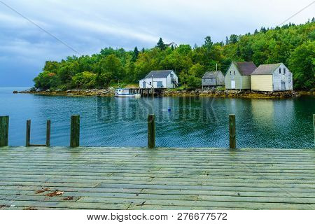 Views Of The Bay, Boats And Waterfront Buildings In The Fishing Village Aspotogan, Nova Scotia, Cana