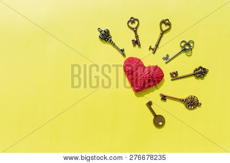 14 February, Keys With The Heart As A Symbol Of Love. Greeting Card With Red Heart On Yellow Backgro