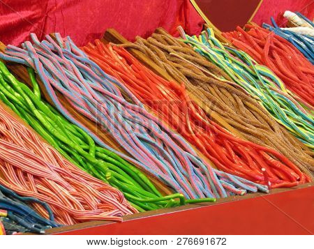 A Colourful Display Of Candy Sweet Liquorish Sticks.