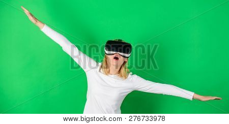 Woman Wearing Virtual Reality Goggles. Woman Enjoying Cyber Fun Experience In Vr. Woman Using Vr Dev