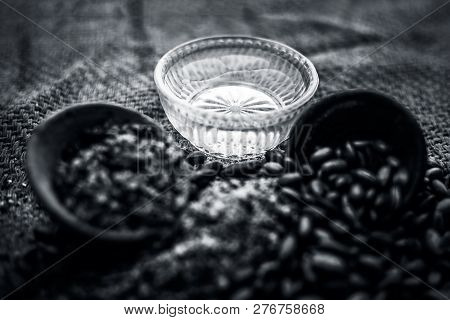 Home Remedy To Cure Lice Or Joon On Brown Colored Surface I.e. Custard Apple Seeds Dried And Powdere