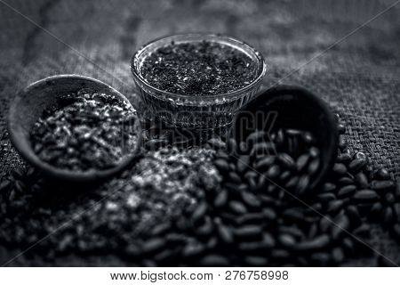 Home Remedy To Cure Lice Or Joon On Brown Colored Surface I.e. Custard Apple Seeds Dried And Powdere