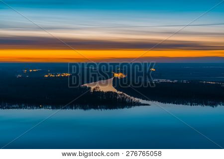 Beautiful River With Big Island With Trees Under Predawn Sky. Bright Orange Stripe In Picturesque Cl
