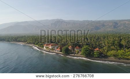 Aerial Seascape Luxury Hotel On Beach Background Mountainss In Tropical Resort. Bali, Indonesia, Tra
