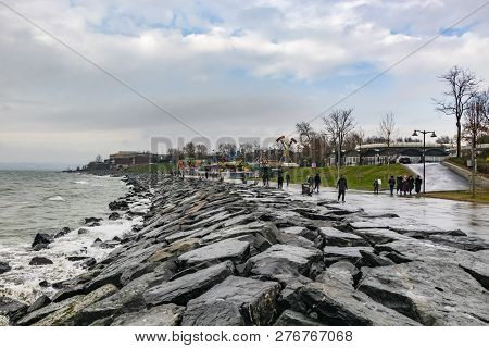 Florya,istanbul-december 26,2018.people Walking On The Beach In Florya By The Marmara Sea And Public