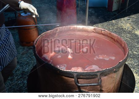 Bronze Cauldron With A Boiled Octopus Inside It At Becerrea Octopus Fair. Festivities, Food, Fairs, 