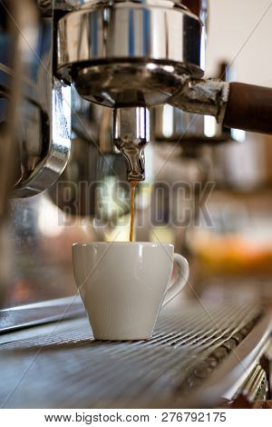 Always Taste Great. Small Cup To Serve Hot Coffee Drink. Brewing Coffee With Espresso Machine. Espre