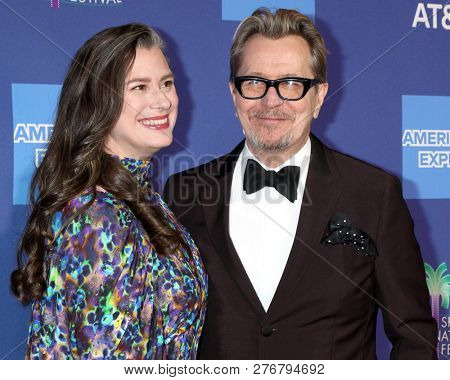 PALM SPRINGS - JAN 17:  Gisele Schmidt, Gary Oldman at the 30th Palm Springs International Film Festival Awards Gala at the Palm Springs Convention Center on January 17, 2019 in Palm Springs, CA