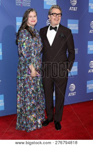 PALM SPRINGS - JAN 17:  Gisele Schmidt, Gary Oldman at the 30th Palm Springs International Film Festival Awards Gala at the Palm Springs Convention Center on January 17, 2019 in Palm Springs, CA