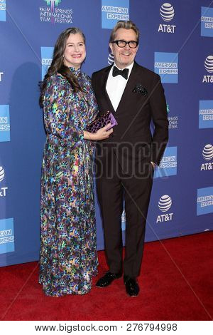 PALM SPRINGS - JAN 17:  Gisele Schmidt, Gary Oldman at the 30th Palm Springs International Film Festival Awards Gala at the Palm Springs Convention Center on January 17, 2019 in Palm Springs, CA