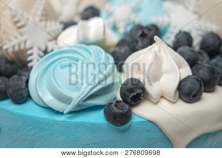 Christmas Stollen Cake With Icing Sugar, Blueberries And Marshmallow. Traditional Christ Pastry. Whi