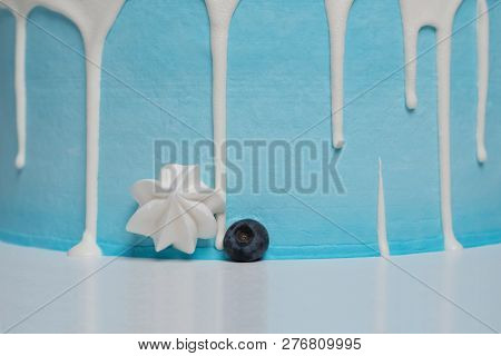 Appetizing Cake With Cream Leaking Over The Cake. Close Up. Copy Space. Stollen Cake Background.
