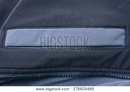 Gray Black Background Fabric Of Clothes With A Pocket And Zip