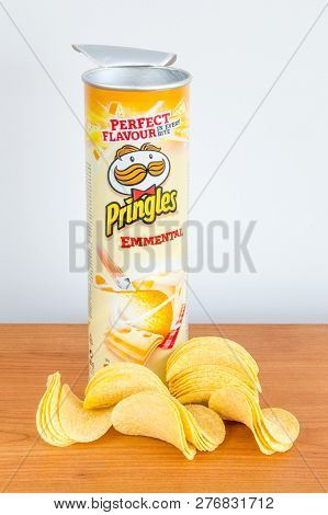 Pruszcz Gdanski, Poland - January 4, 2019: Open Tube Of Pringles Chips With Pingles Chips On The Woo