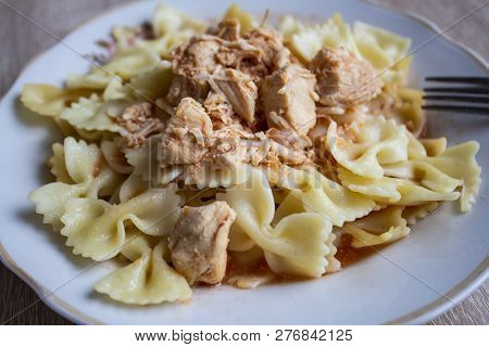 Vermicelli On A Plate. Vermicelli On A Wooden Background. Meat Spaghetti