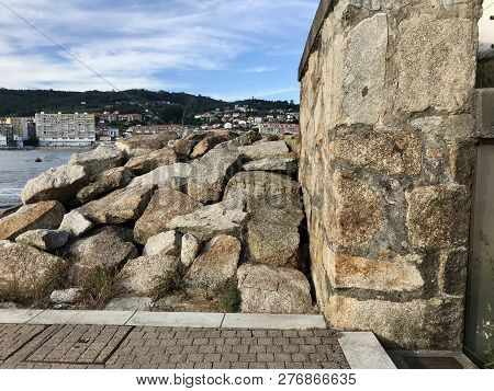 View Of The Some Rocks In The Harbour On Sanxenxo Galicia Spain