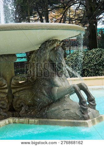 Federico Fellini Park With Fountain Of Four Horses In Rimini, Italy. Winter Walk In The Park In Ital