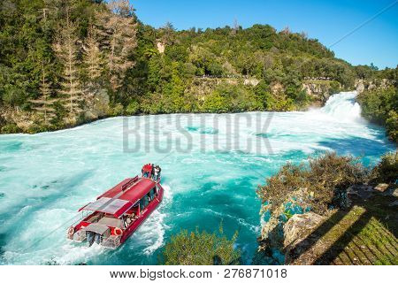 Taupo, New Zealand - April 26 2017: Tourist Adventure In Huka Falls With Huka Falls River Cruise In 