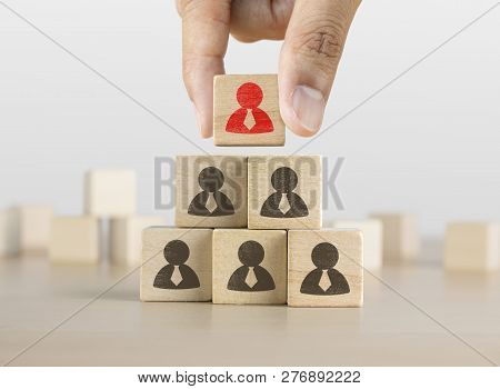 Hand Arranging Wooden Blocks Stacking As A Pyramid Staircase On White Background. Leadership, Human 