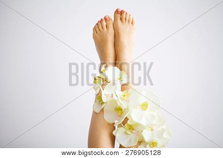 Hair Removal. Close Up Woman Hands Touching Long Legs, Soft Skin