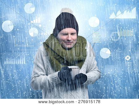 Young businessman shivering with graphs, reports and chart concept