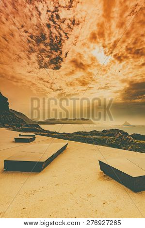Kleivodden Rest Stop Area Viewpoint With Stone Seating Bench. Arctic Ocean View With Clouds Sky. Att
