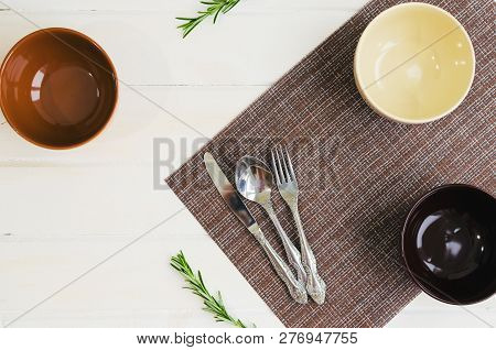 Set Of Bowls With Fork, Spoon And Knife. Written Breakfats, Lunc