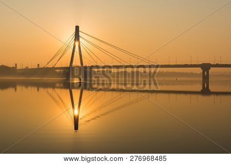 Silhouette Of Northern Bridge During Golden Hour At Sunrise In Kyiv, Ukraine