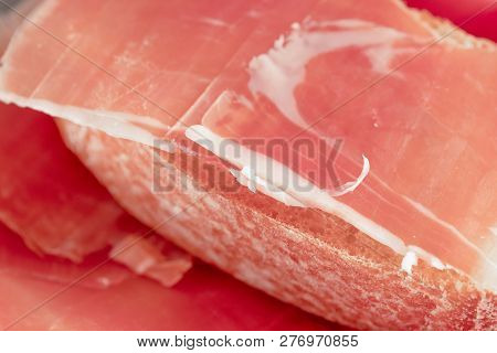 Spanish Ham In Dry Form, Jamon Serrano, Bello, Italian Ham, Chopped Layers With Bread And Cherry Tom