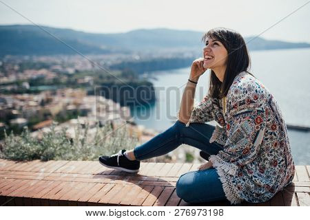 Happy Woman Traveler Smiling At Italian Coast View.woman Traveling To European South Coast.enoying S